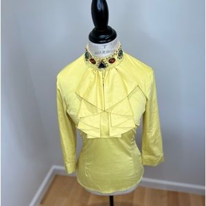 Classy top adjourn with crystals on a collar.